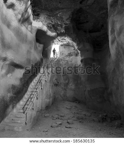 Underground tank for storing water in the ancient fortress of Masada - Israel (black and white)