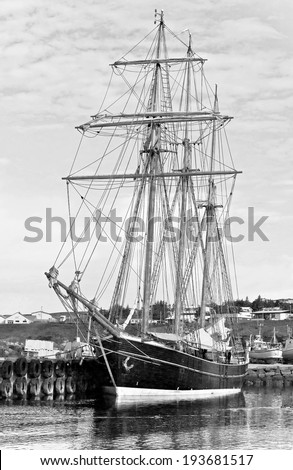 A beautiful schooner in the port of Reykjavik city, Iceland (black and white)