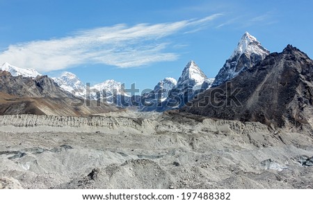 Panoramic view Gokyo Glacier, Everest, Lhotse, and Chola peak in the area of Cho Oyu - Gokyo region, Nepal, Himalayas