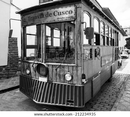 Tourist bus stylized vintage tram - Cusco, Peru (black and white)