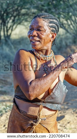 BUITEROS, NAMIBIA - JULY 17, 2014: Portrait of a woman Bushmen. The San people, also known as Bushmen are members of various indigenous hunter-gatherer peoples of Southern Africa