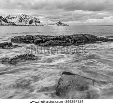 View to beautiful fjord on Lofoten islands at sunset - Norway (black and white)