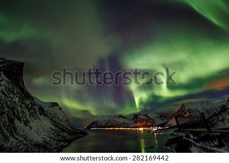 Aurora borealis (Polar lights) over the mountains in the North of Europe - Lofoten islands, Norway