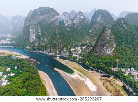 Nice karst mountains and the Li River. View from the hill above town of the Hingping - China