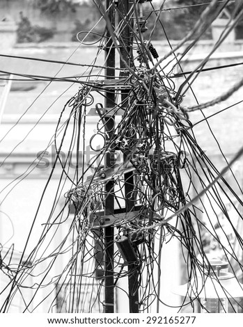 The chaos of cables and wires in Valparaiso - Chile (black and white)