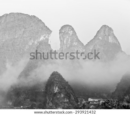 Beautiful karst mountains. View from the hill in the town of Hingping - China (black and white)