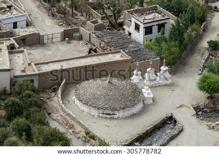 Ancient stupas at the foot of the hill with the Thiksey Gompa - Ladakh, Jammu and Kashmir, India