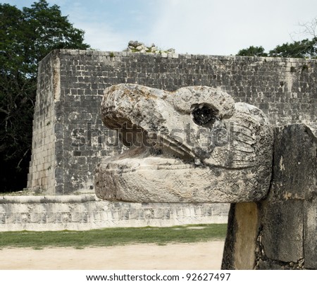The head of the snake at the base of the playground for ball games in Chichen Itza, Mexico