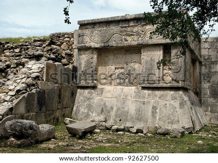 The bas-relief on the ruins of the palace in Chichen Itza, Mexico