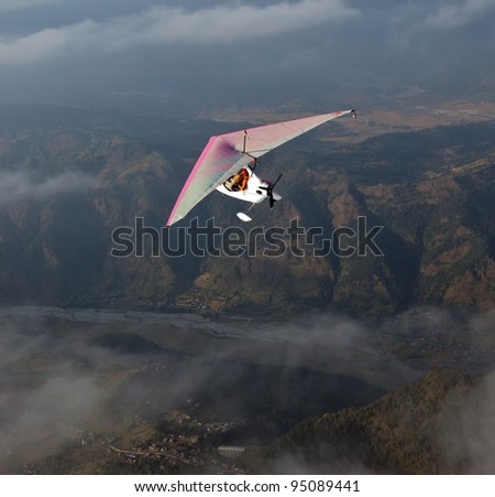 The motor hang-gliding in the sky near the Pokhara- Nepal