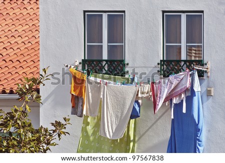 Drying clothes on a small street - Portugal