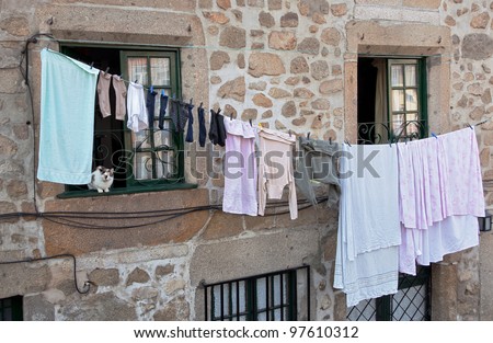 Cat guards to dry linen - Braga, Portugal