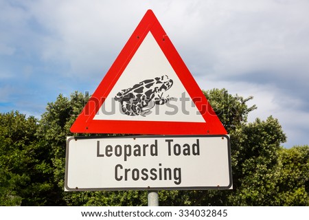 Funny road sign warning about leopard toad crossing