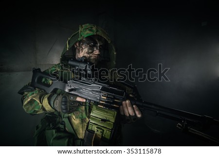 A military man with a machine gun. Fantasy. The post Apocalypse.