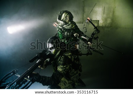 Military people are standing with crossbows. Fantasy. The post Apocalypse.