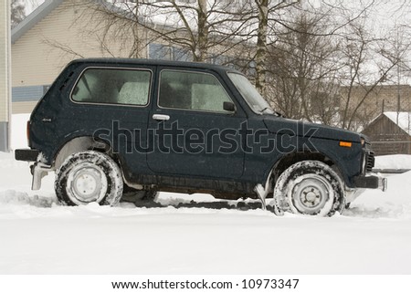 stock photo 4x4 russian jeep in snow