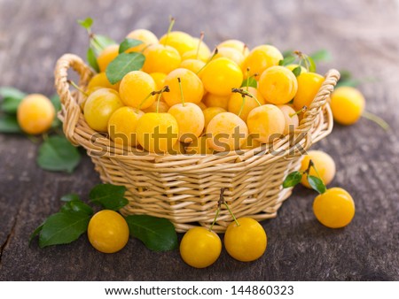 Yellow plums in the basket