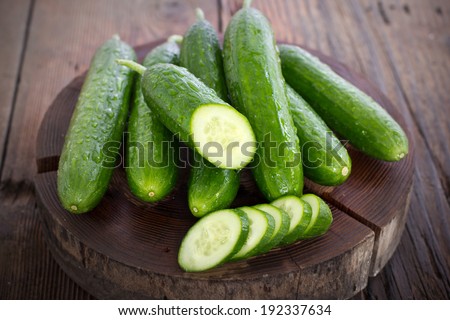 Fresh cucumber on the wooden table