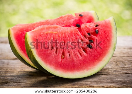 Watermelon slices on the wooden table