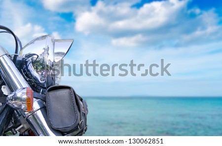 chromed motorcycle by the sea