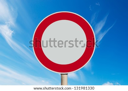 blank road sign under a cloudy sky