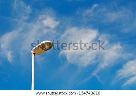 street pole under a cloudy sky