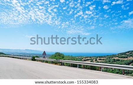 panoramic view of a country road along the coastline