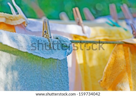 laundry line with colorful towels