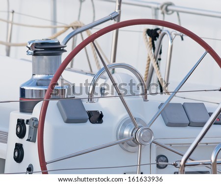 steering wheel on a white boat