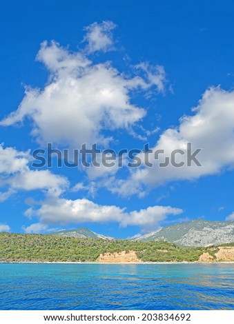 Cala Gonone shoreline on a cloudy day