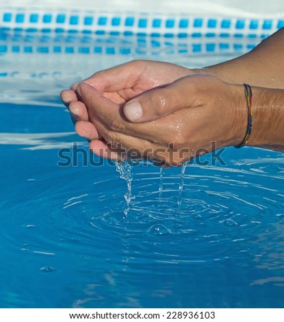 water dripping from man hands