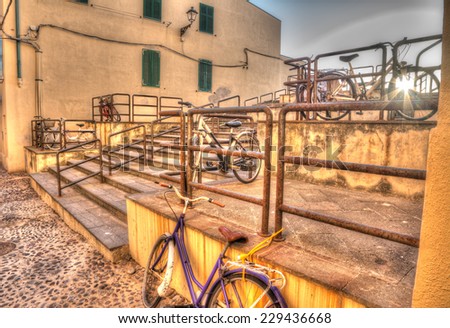 Old bicycles in Alghero old town. Heavy processed for hdr tone mapping effect