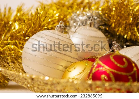 close up of colorful christmas ball with golden decorations