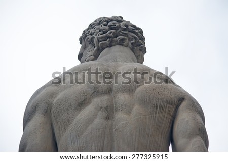 detail of Hercules statue seen from behind