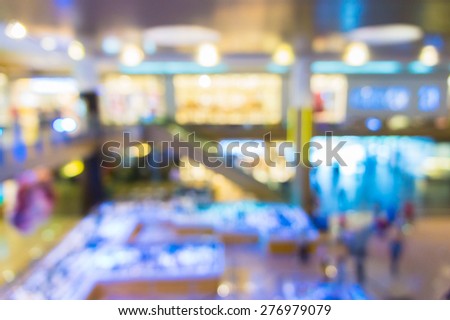 Abstract blurred background of illumination inside of shopping mall