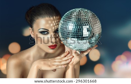 Young beautiful woman at night disco club