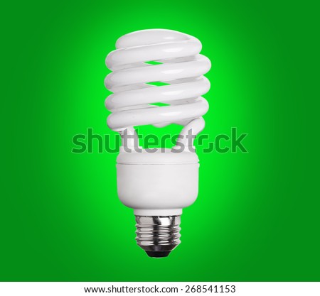 CFL Fluorescent Light Bulb on green background