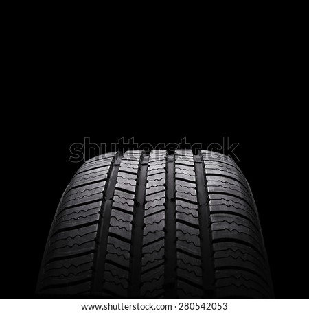 automobile rubber tires isolated on black background