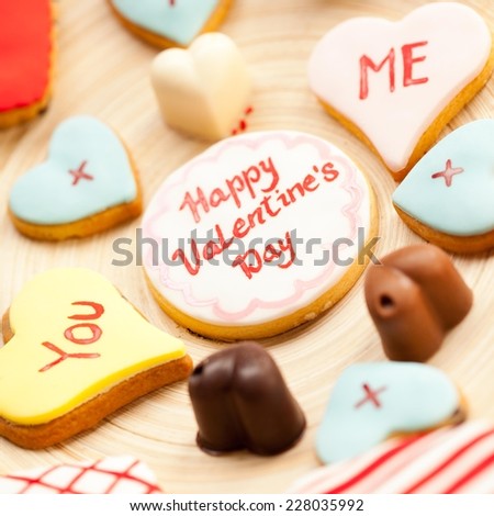 Cute Valentine\'s cookie with Happy valentine\'s day written on it.