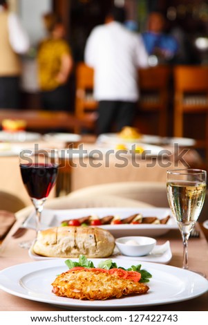 Luxury restaurant table with wine and dinner