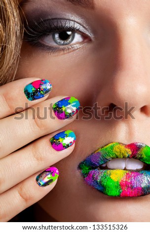 Half Face Of Attractive Girl With Beautiful Multicolor Holographic Minx Nails And Bright Colorful Make-Up
