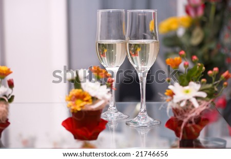 stock photo Two glasses with champagne on decorated table