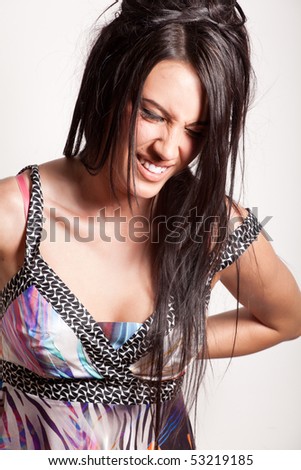 stock photo : Attractive emotional brunette girl with beautiful hairstyle in 