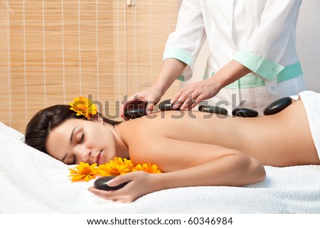 Lifestyle - Pagina 3 Stock-photo-stone-therapy-woman-getting-a-hot-stone-massage-at-spa-salon-60346984
