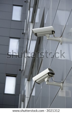Security cams attached on corner of the building