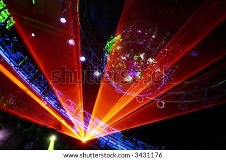 stock photo Fantastic Orange Laser Show at the Disco Party night