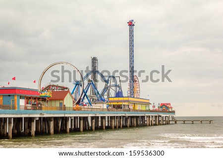 The Pleasure Pier in Galveston, Texas / Pleasure Pier / The Pleasure Pier attracts visitors to Galveston Island, Texas