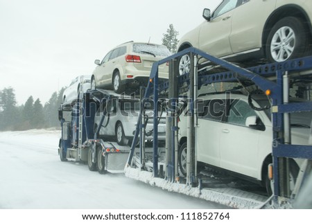 I-84, EASTERN OREGON - JAN 24 : Large trucks fight a winter storm  on the mountain highway   on Jan 24, 2012  in Eastern Oregon