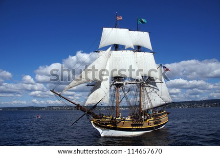 KIRKLAND, WASHINGTON - AUG 31 - The wooden brig, Lady Washington, sails on Lake Washington    during a mock sea battle as part of Labor Day festivities on Aug 31, 2012 near Kirkland , Washington.