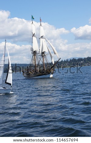KIRKLAND, WASHINGTON - AUG 31:The wooden brig, Lady Washington, sails on Lake Washington    during a mock sea battle as part of Labor Day festivities on Aug 31, 2012 near Kirkland , Washington.